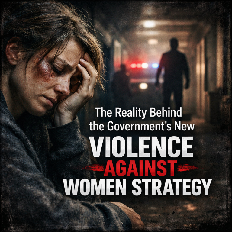 A distressed woman sits with visible facial bruising in a dark corridor, symbolising the hidden reality of domestic abuse and violence against women in the UK, with text highlighting the Government’s new violence against women strategy.