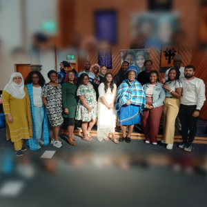 Team members of Contento Social Homes gathered together during a team building session to strengthen collaboration and support their mission of helping survivors of domestic abuse.